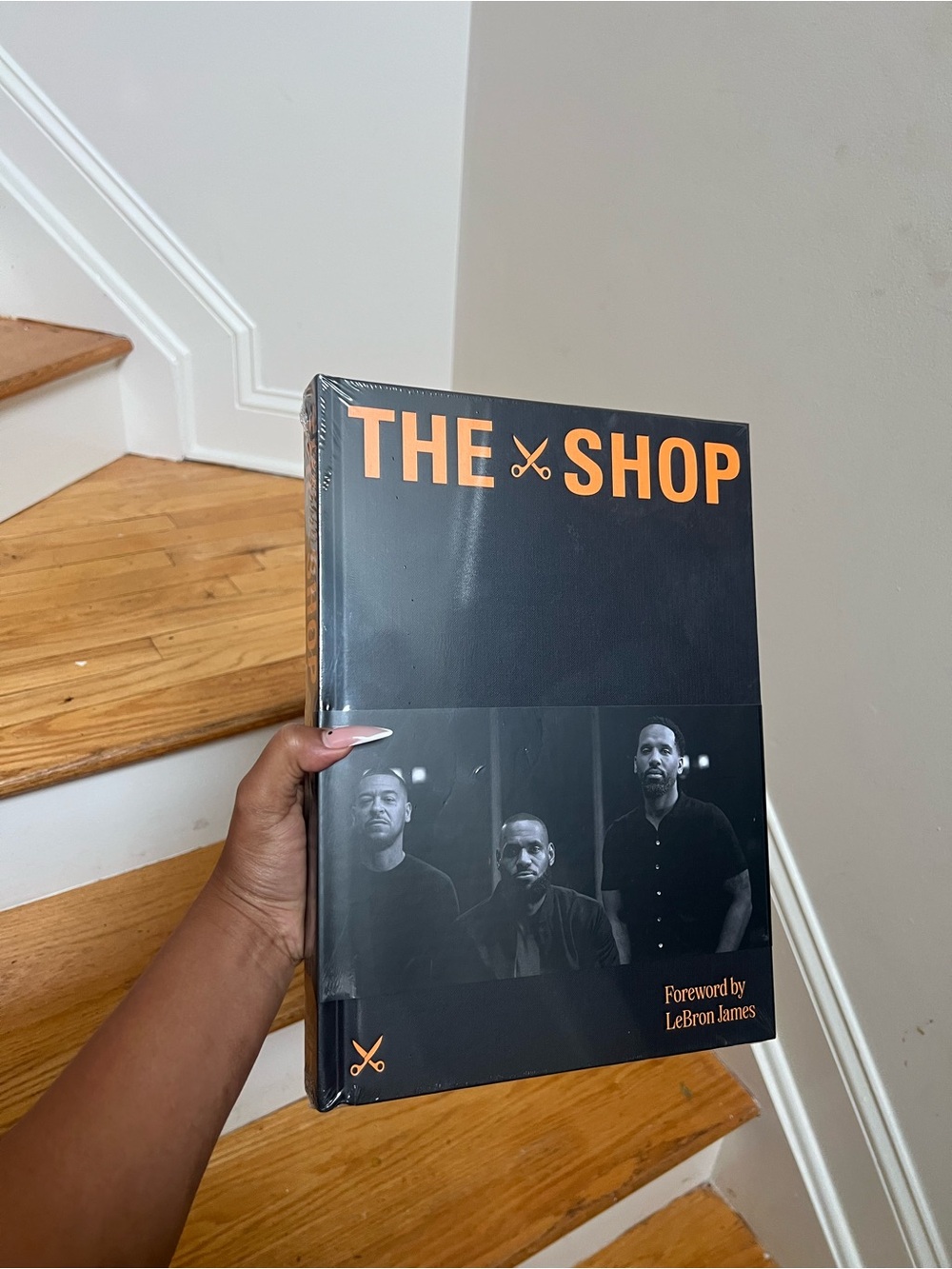 THE SHOP Hardcover Book - Black with Orange Text